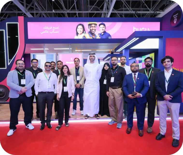 The Huru team in front of the Huru Bus stand at Seamless Middle East